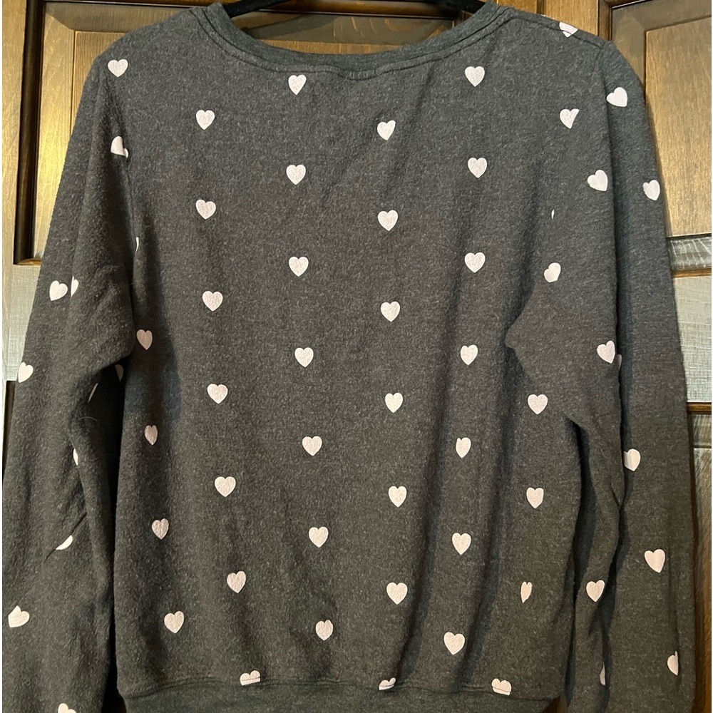 Womens gently used wildfox sweatshirt with pink hearts